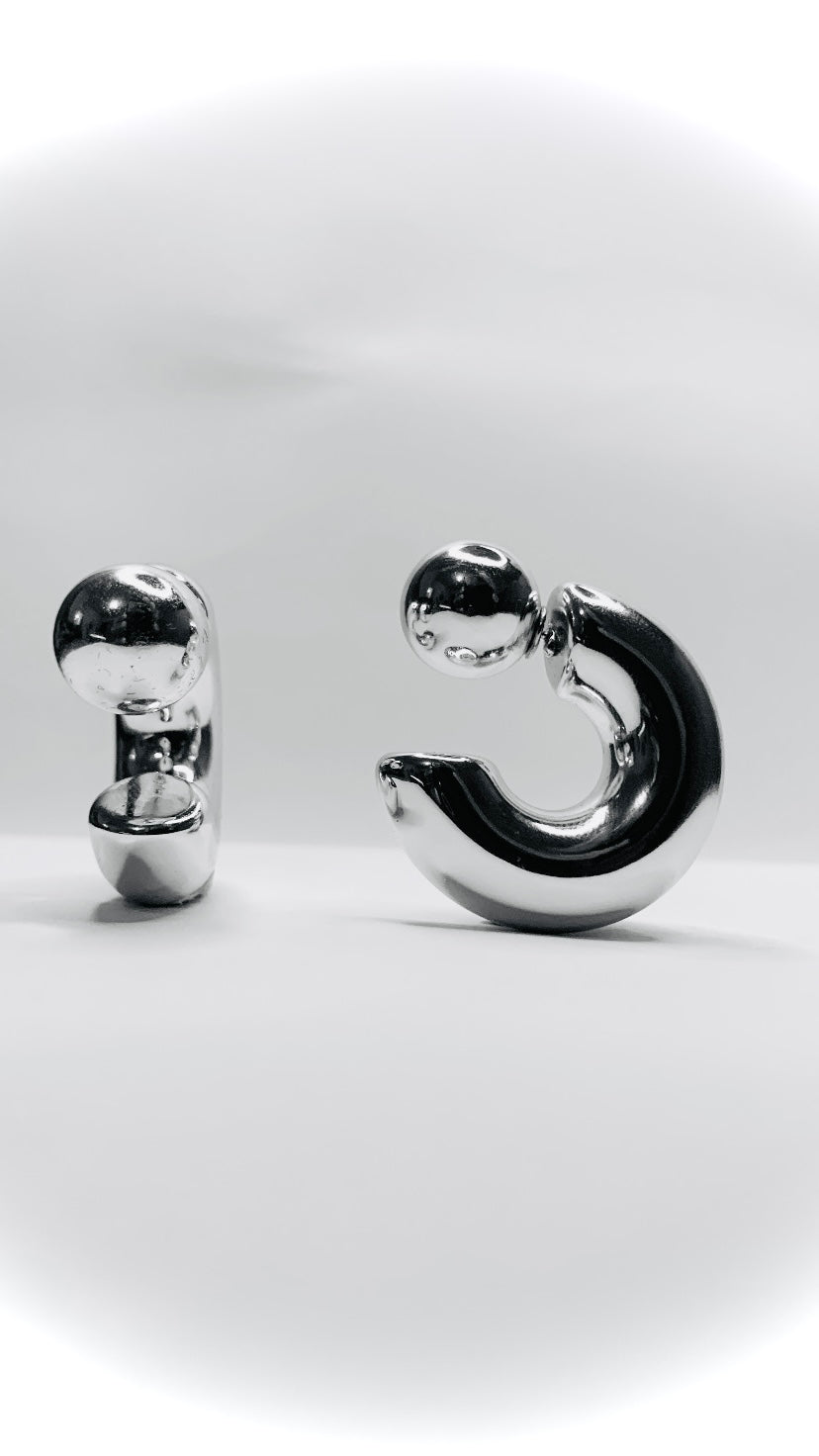 C-shaped silver hoops